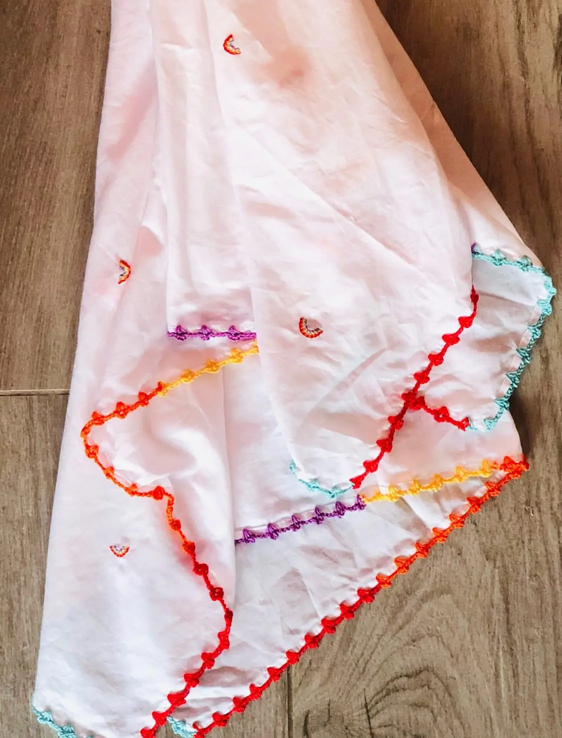 rainbow hand embroidered work on swaddle cloth